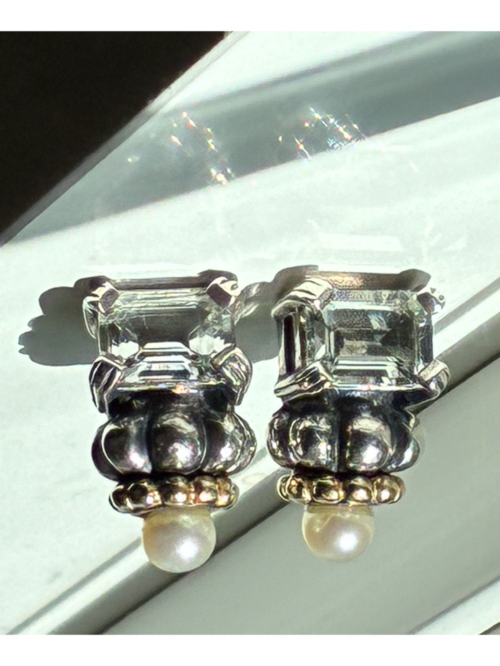 Lagos Pearl and Topaz Glacier earrings from the caviar collection.
